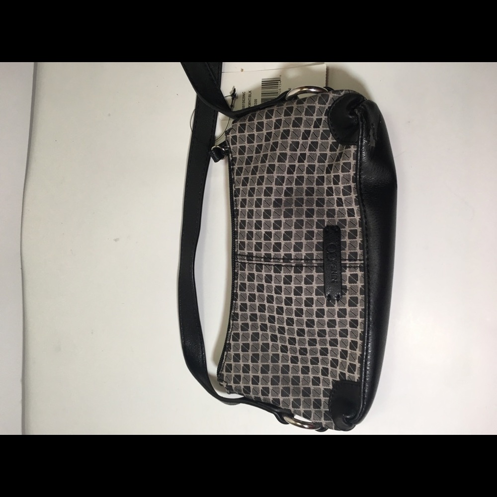 Nine&Co small hamd bag used good condition